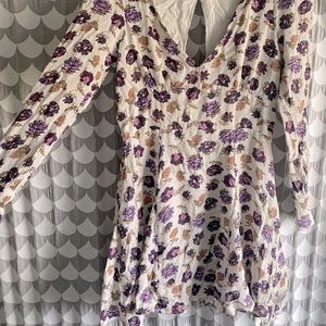 FREE PEOPLE long-sleeved dress with back cut out.